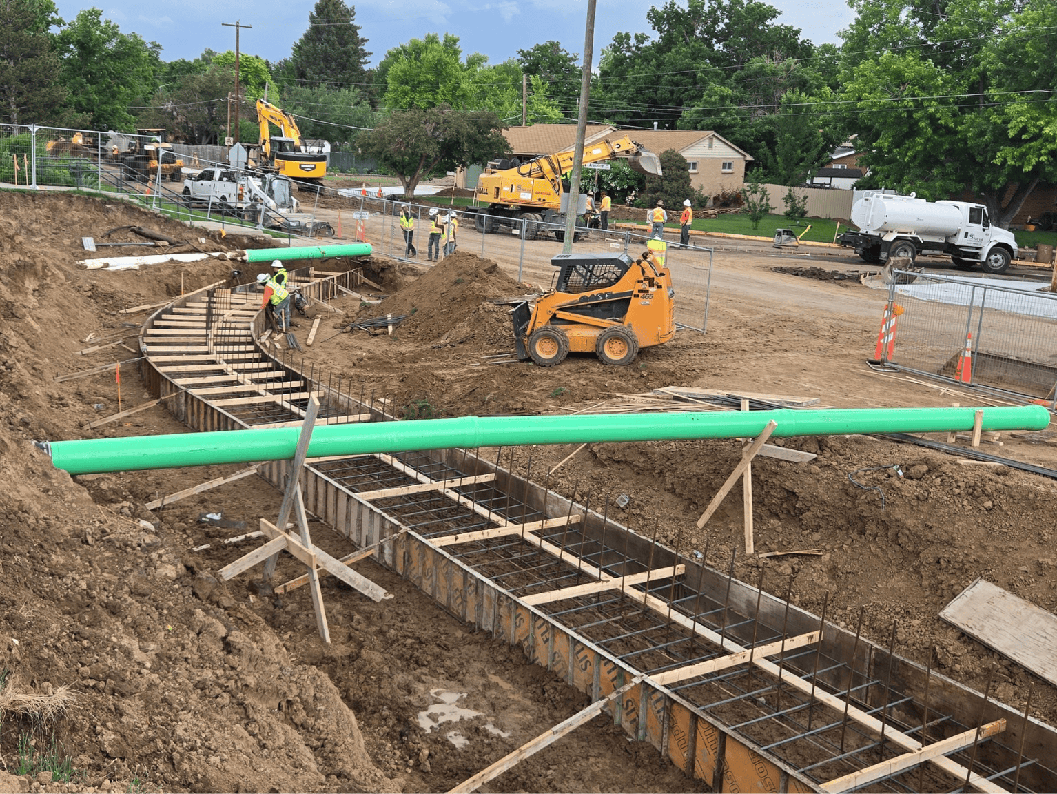 Concrete retaining wall foundation and rebar installation in Littleton CO school site construction project