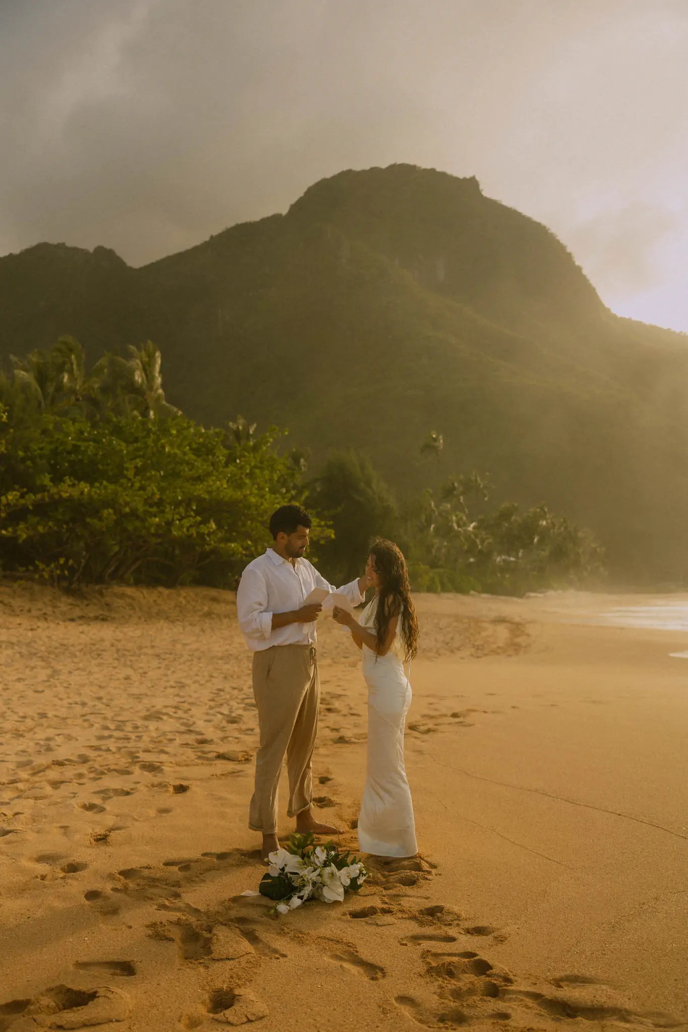 How to elope in Kauai like this couple did at sunset