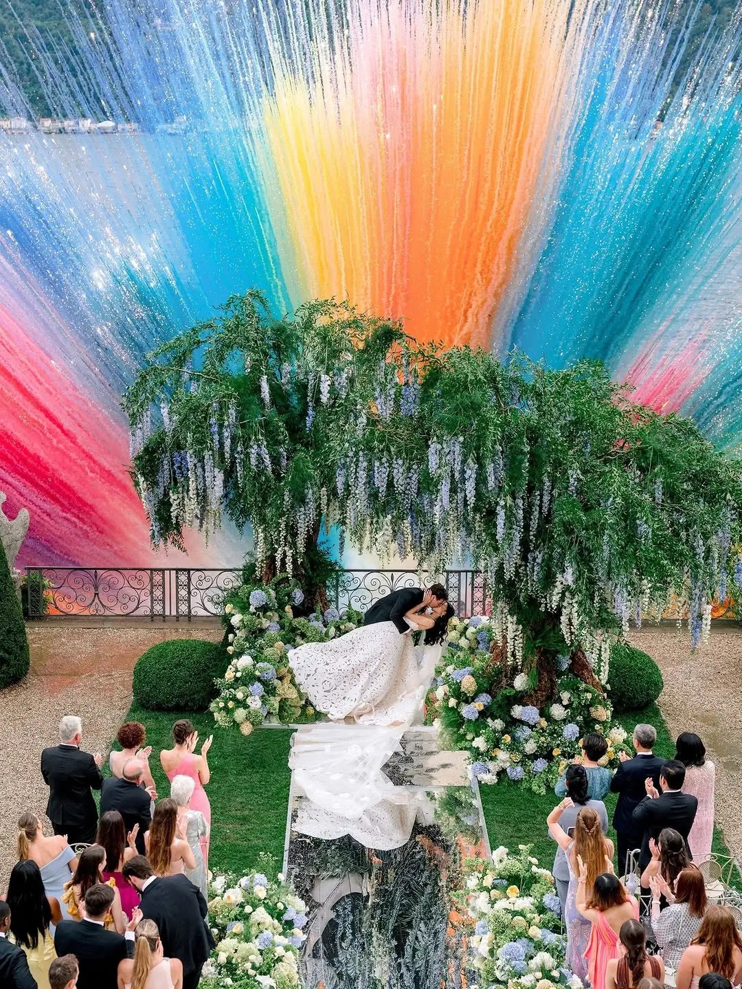 Becca Bloom and David Pownall wedding photo with colorful fireworks