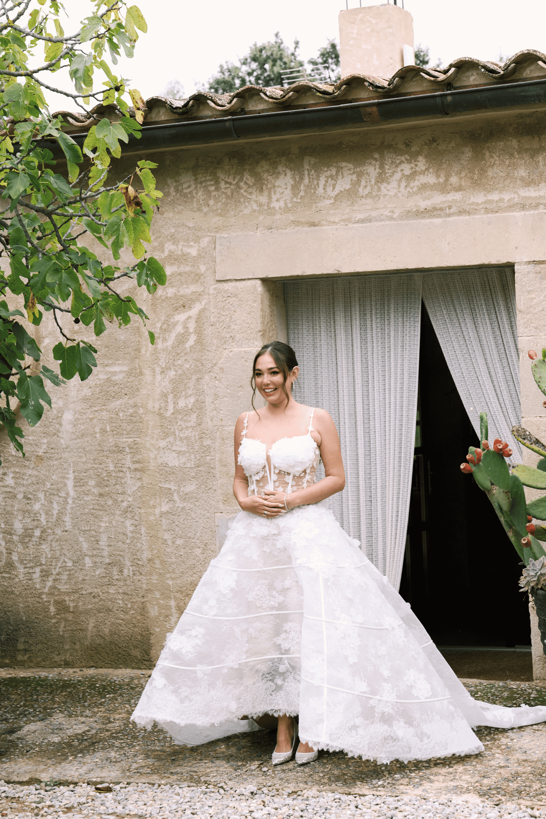 bride walking out in her wedding dress