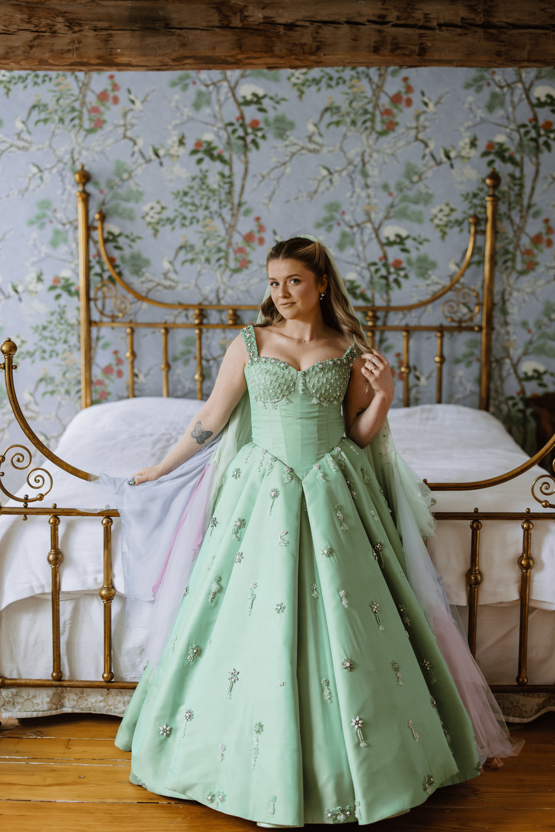 bride Madison Chamberlain in a custom green wedding dress