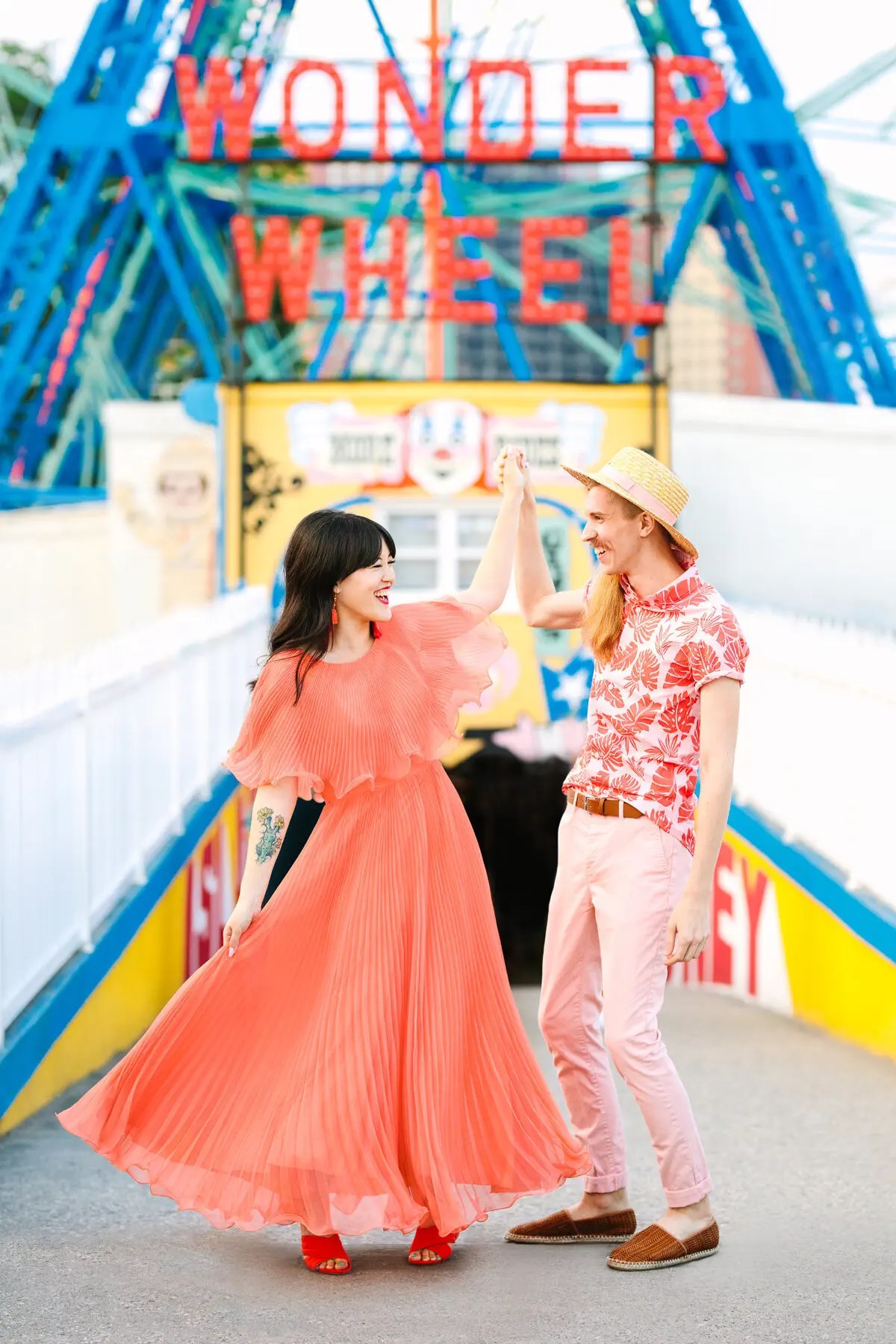 couple at an amusement park for their summer bucket list