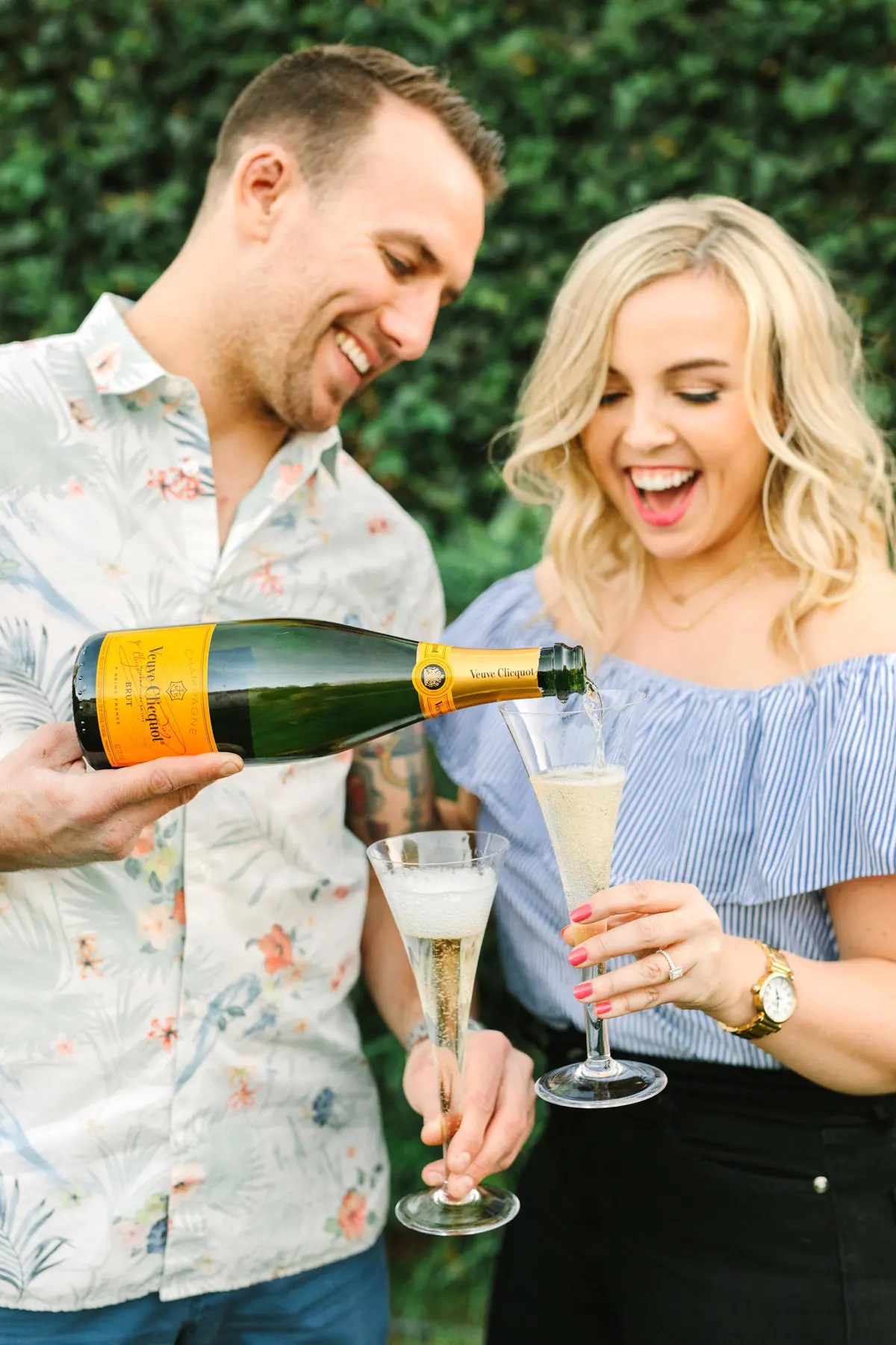 couple celebrating with champagne