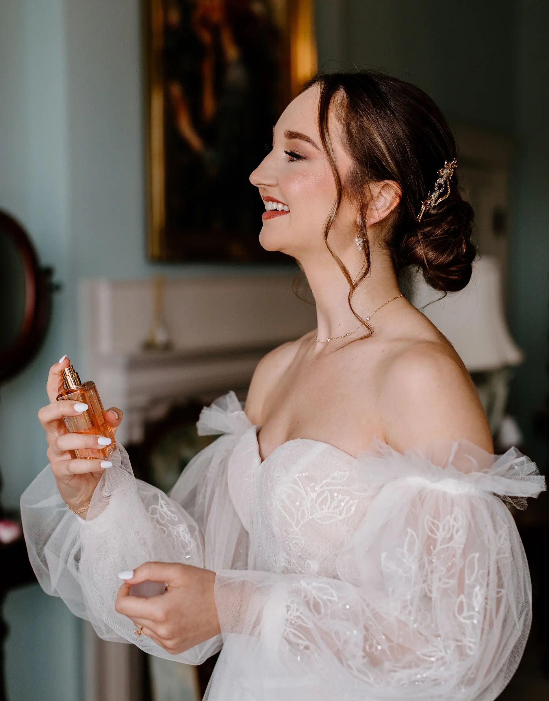 bride using one of the best wedding perfumes before her ceremony