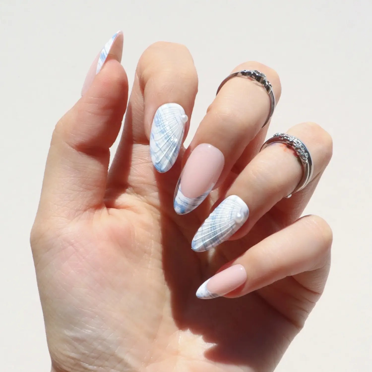 blue and white shell press on nails from Nail Reformation
