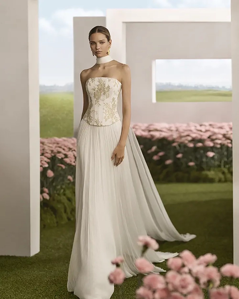 Rosa Clará ROMERO wedding dress with strapless corset embroidered in gold and champagne florals over a pleated silk muslin skirt