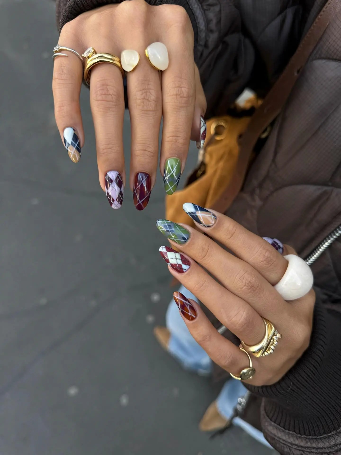 Long almond fall nails in multicolor argyle plaid with navy, burgundy, olive green, and lilac