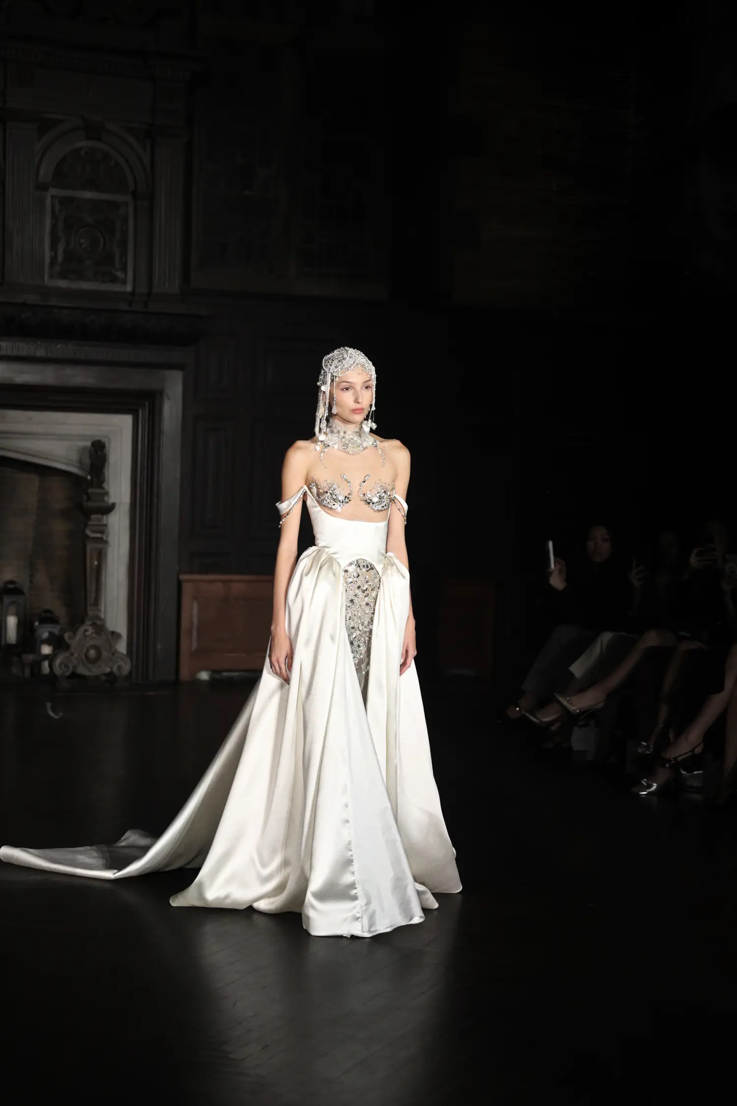 Alon Livné Fall 2027 gown with shell-embroidered bodice, satin skirt, and beaded hood