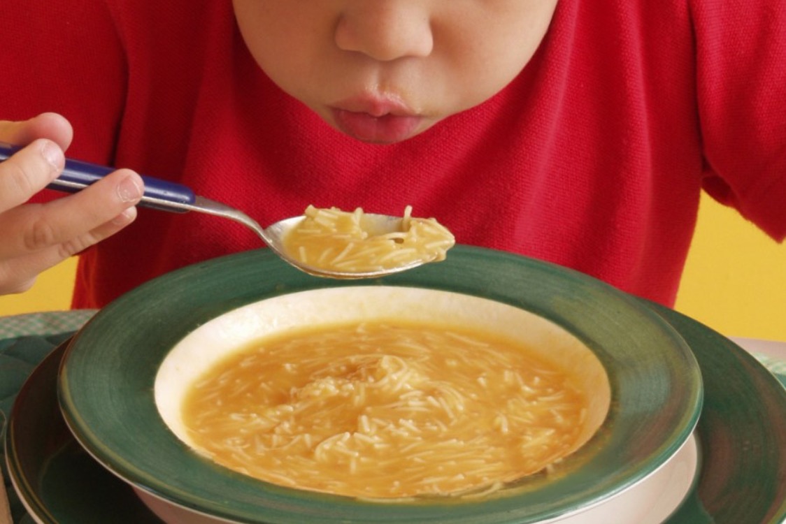 Curiosity Corner Blowing on Hot Soup