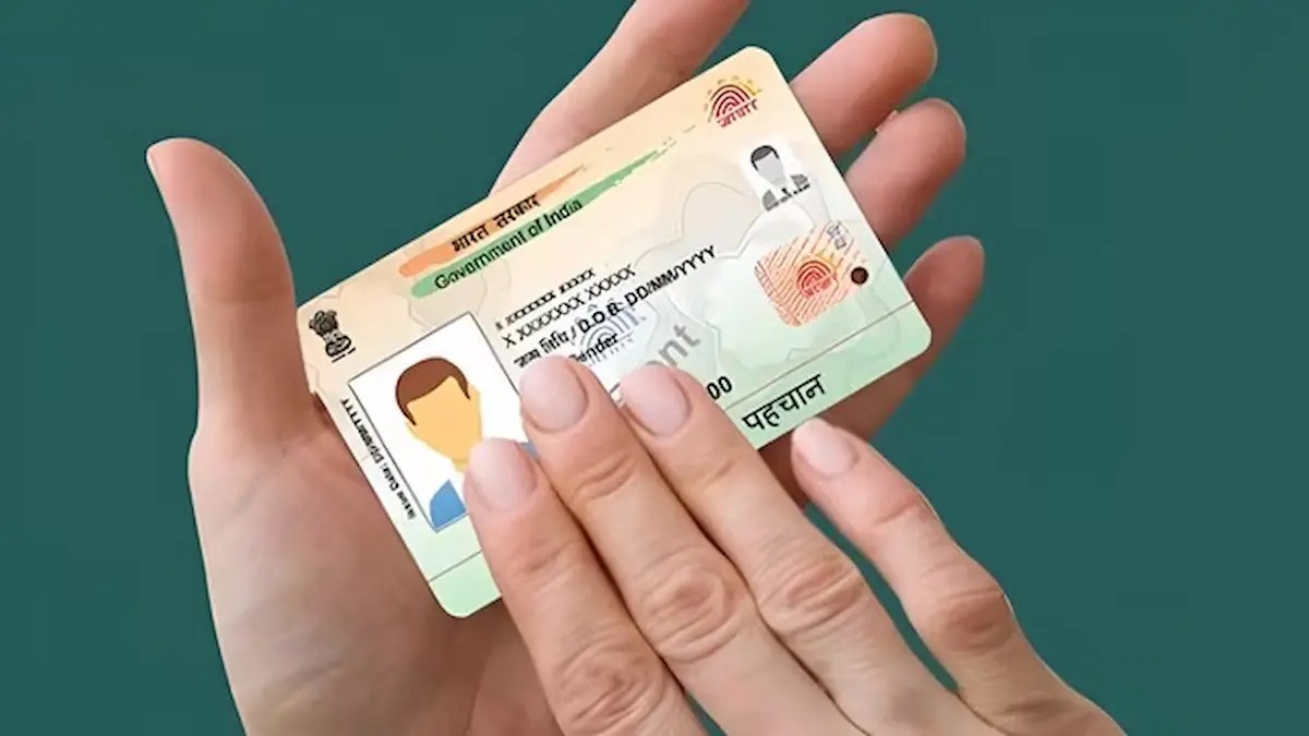 Aadhar PVC card in hand