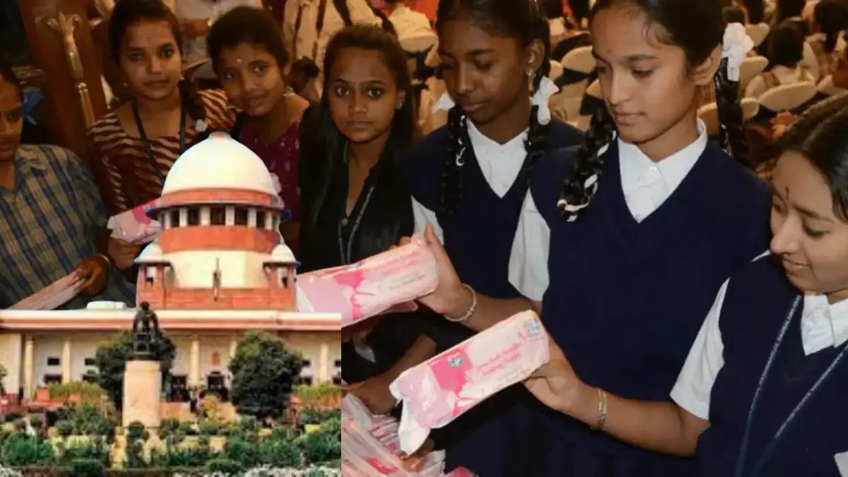 Schoolgirls holding sanitary pads with the Supreme Court building shown in the background.