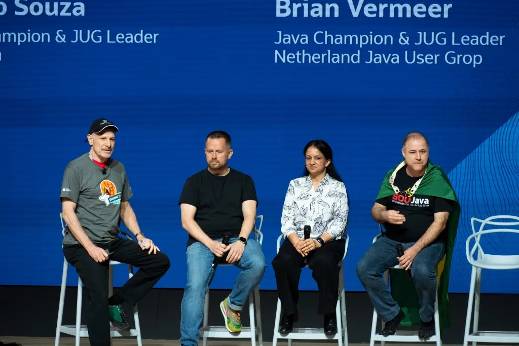 Jim Grisanzio hosts a JavaOne 2026 Community Keynote Panel with Brian Vermeer, Mala Gupta, and Bruno Souza. Photo by Yuichi Sakuraba.