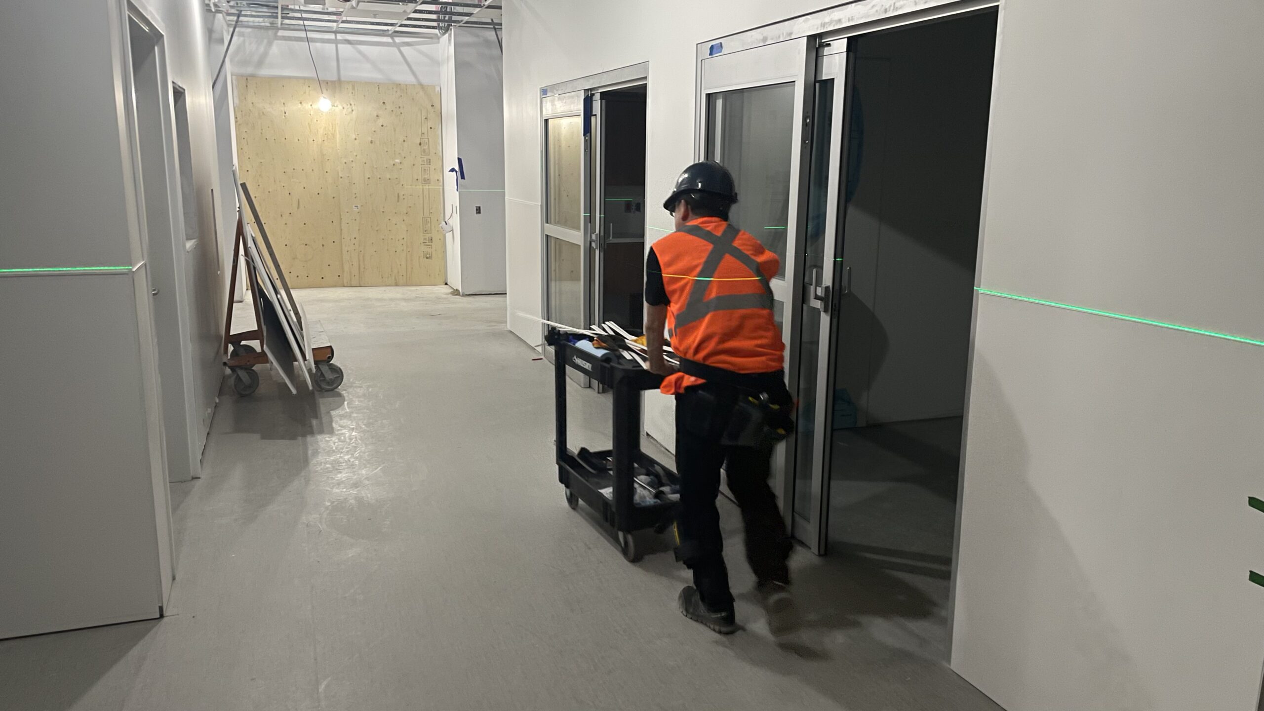 GRIT crew installing wall protection