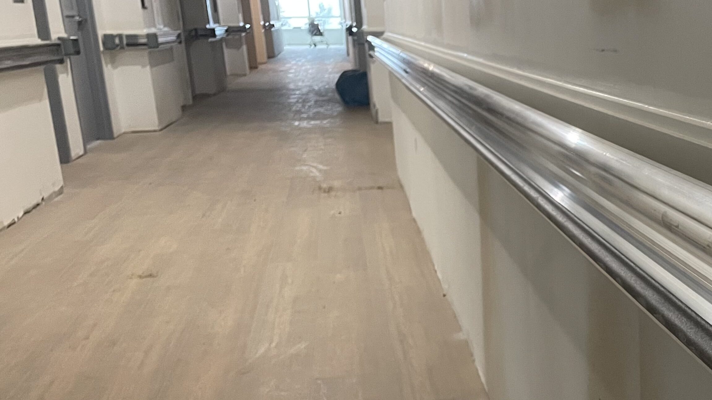 Handrails installed in a retirement residence corridor