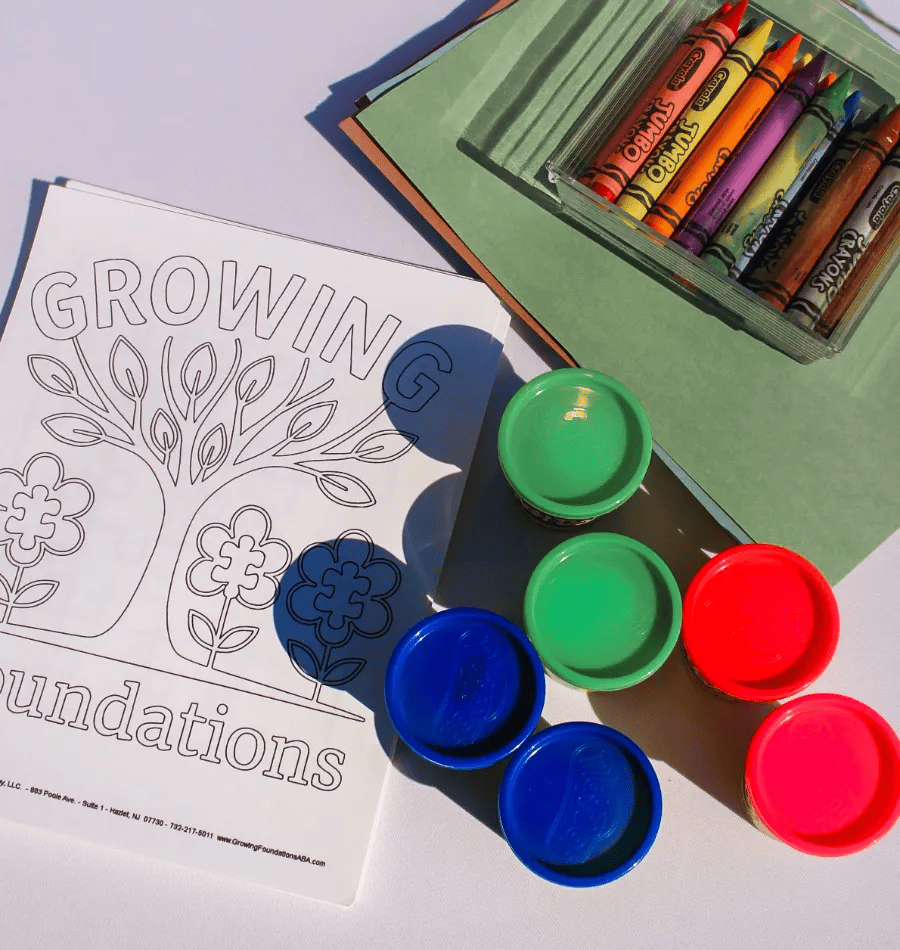 Play dough and a coloring page with the Growing Foundations tree