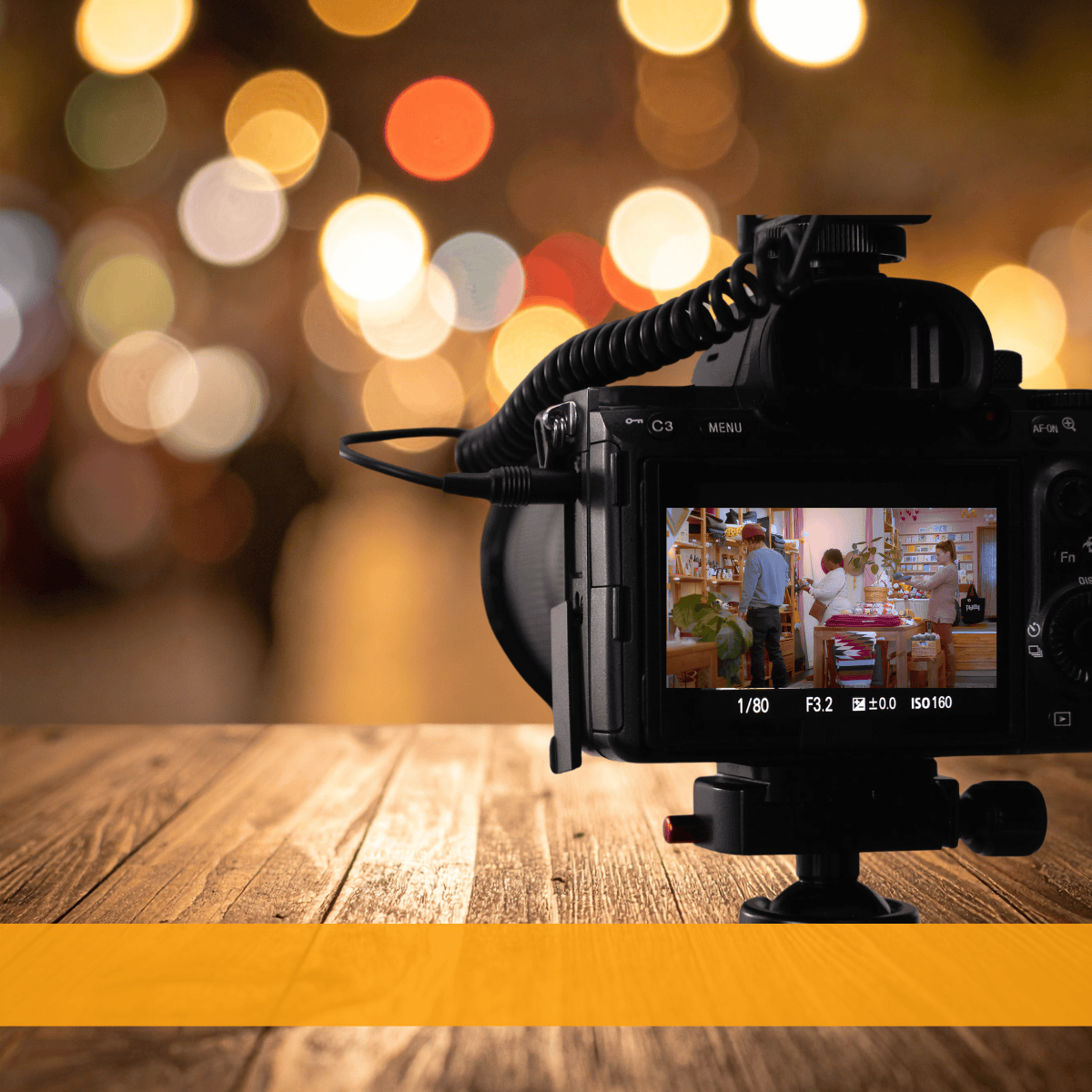 Behind the scenes camera monitor displaying active footage from the Vera Doyle commercial shoot.