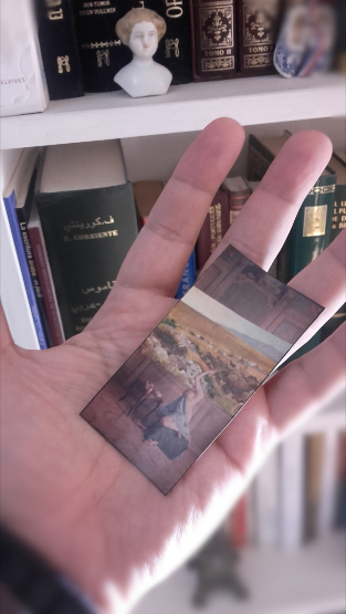 The Model Holding up a Landscape (2021) in hand of its author, as a reference