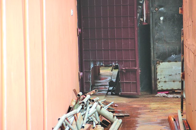 The hole that the men cut to gain access to the building