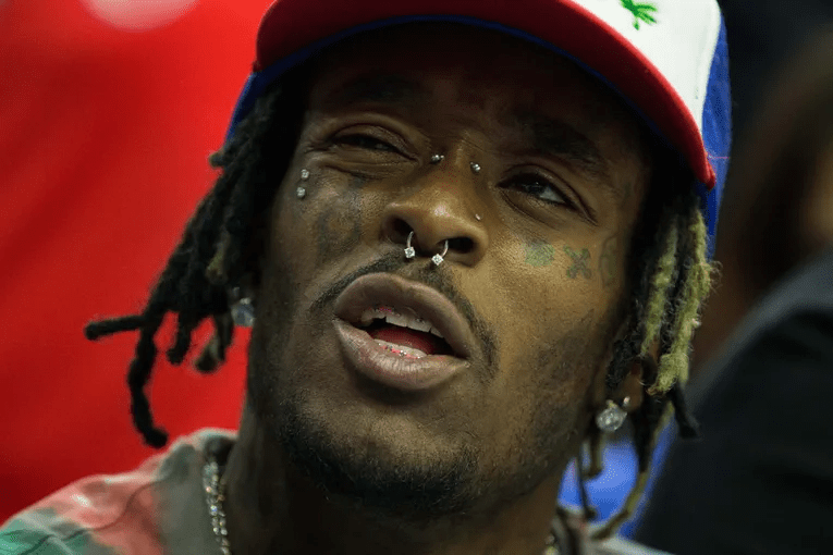Lil Uzi Vert's Heartwarming Gesture: Signing a Fan's Baby at Concert