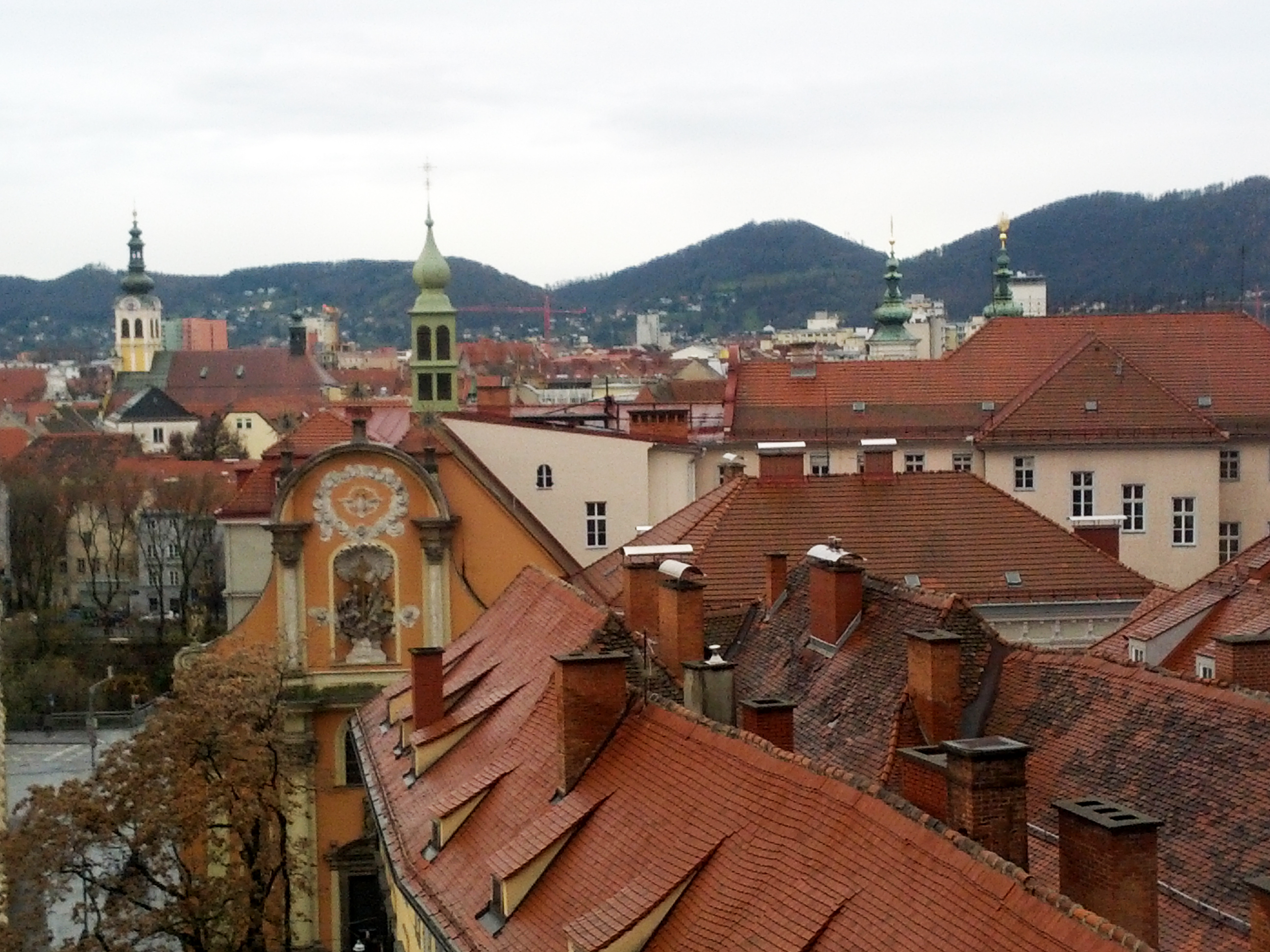Charming rooftops viewed from the hill in the center Graz, Austria.