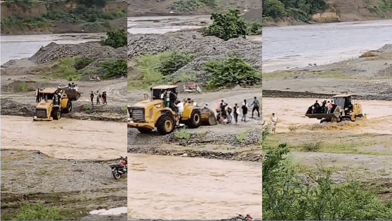 ¡Les toca arriesgar la vida! Una comunidad de Sopetrán cruza el río en retroexcavadoras tras el colapso de un puente