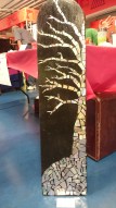 Tiled mosaic tree made from CDs.