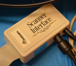 The hand-held scanner interface. The scanner itself outputs serial data, this scanner interface provides power to the scanner and converts the serial into something the Amiga can understand.