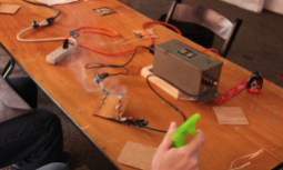 Making Lichtenberg figures in a piece of wood with a transformer