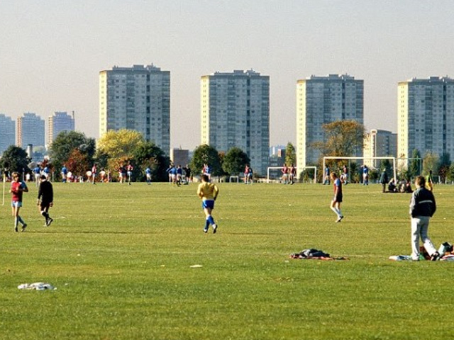 An image of people playing football on Hackney Marshes.