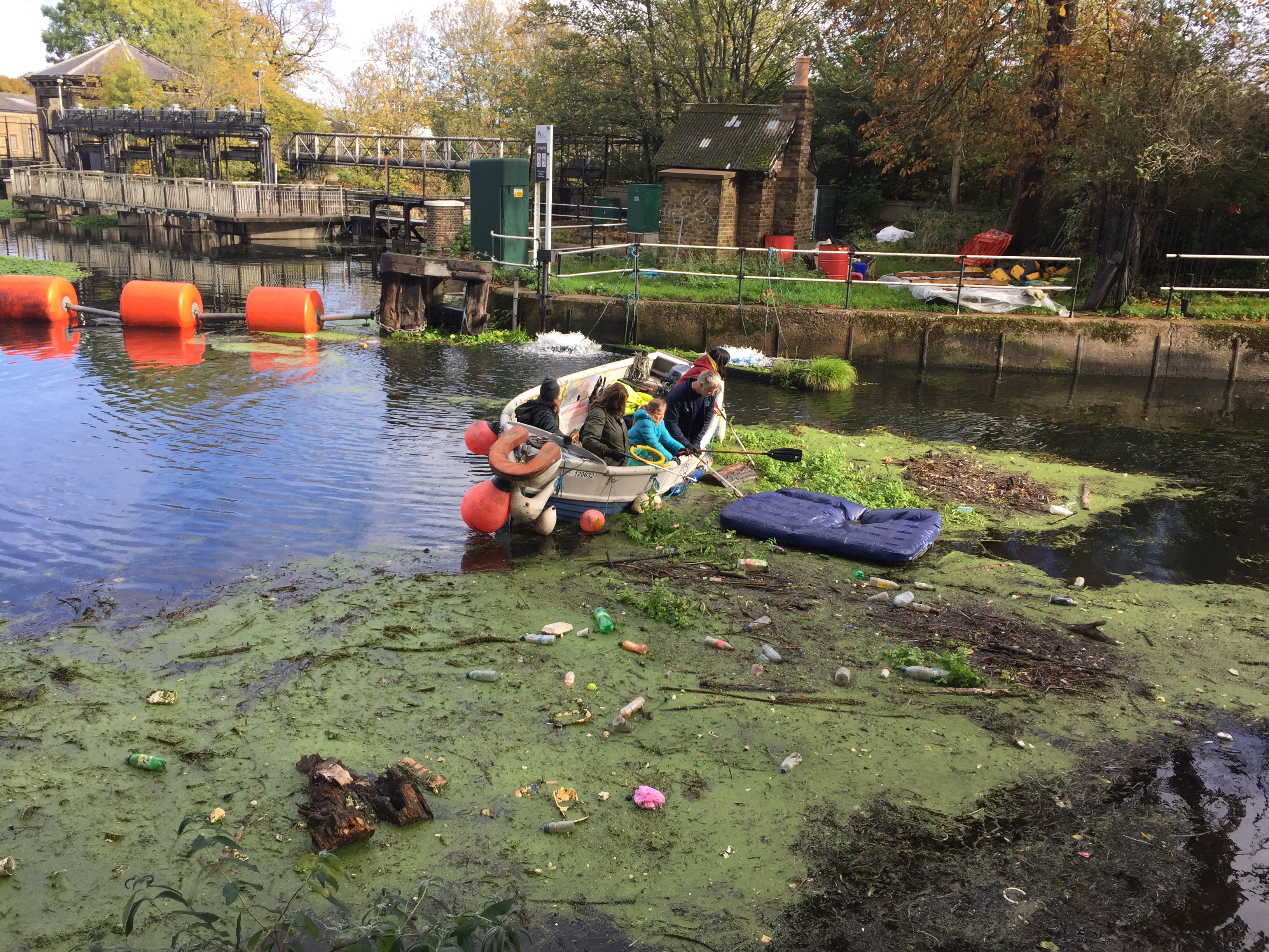 Members of Plastic Free Hackney cleaning up the River Lea
