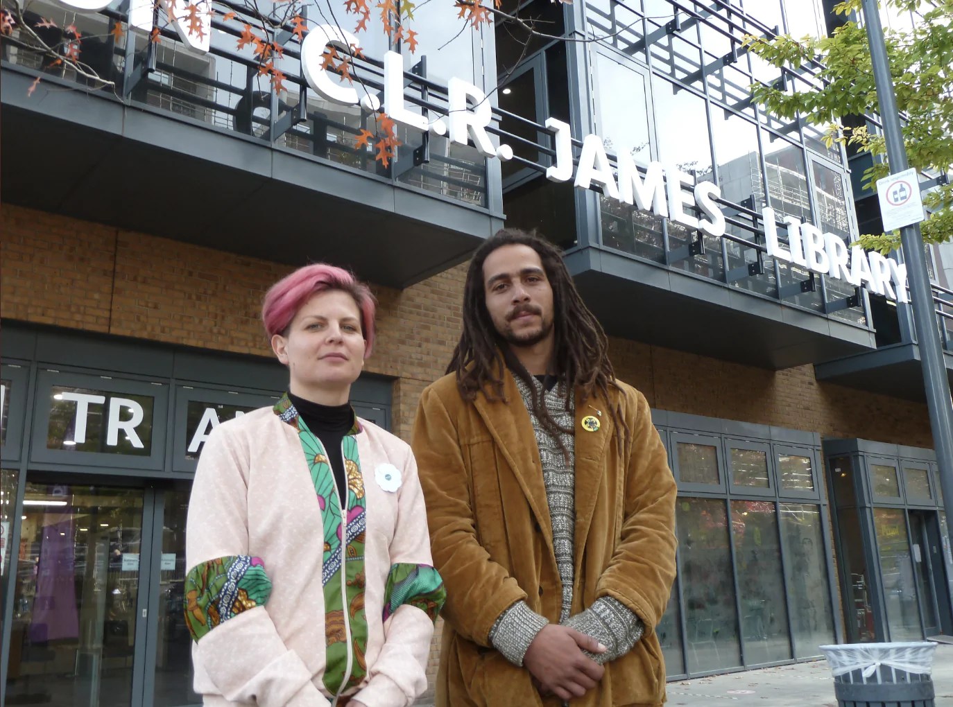 Zoë Garbett and Tyrone Scott outside Dalston CLR James Library
