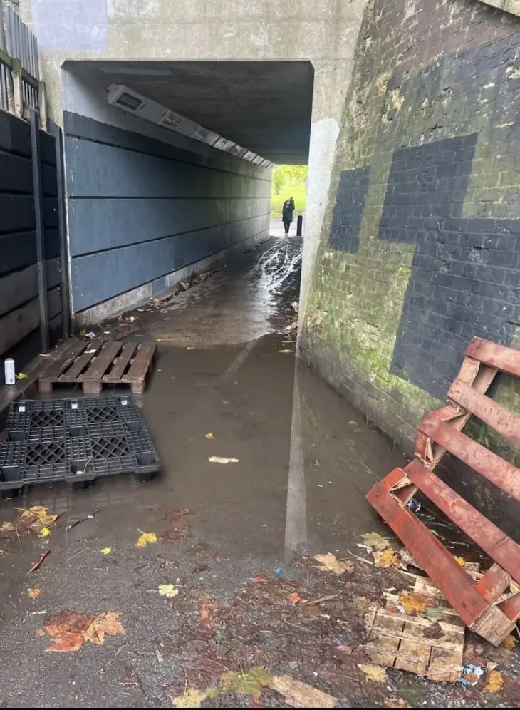 An image of the flooding of an underpass connecting Hackney Downs and Amhurst Terrace.