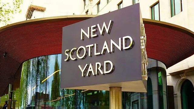 The building sign of New Scotland Yard, London.