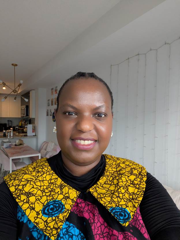 Close up picture of a black woman showing off her makeup look