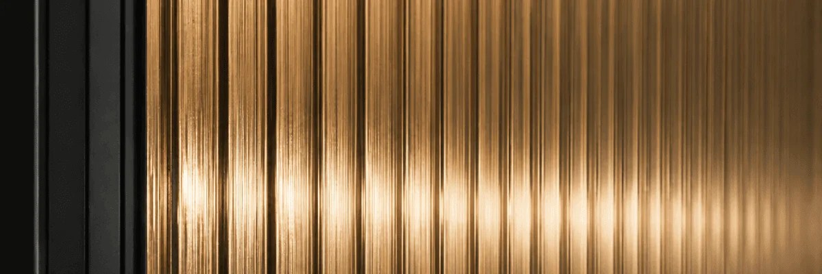 Close-up of fluted glass kitchen cabinet finish on luxury door