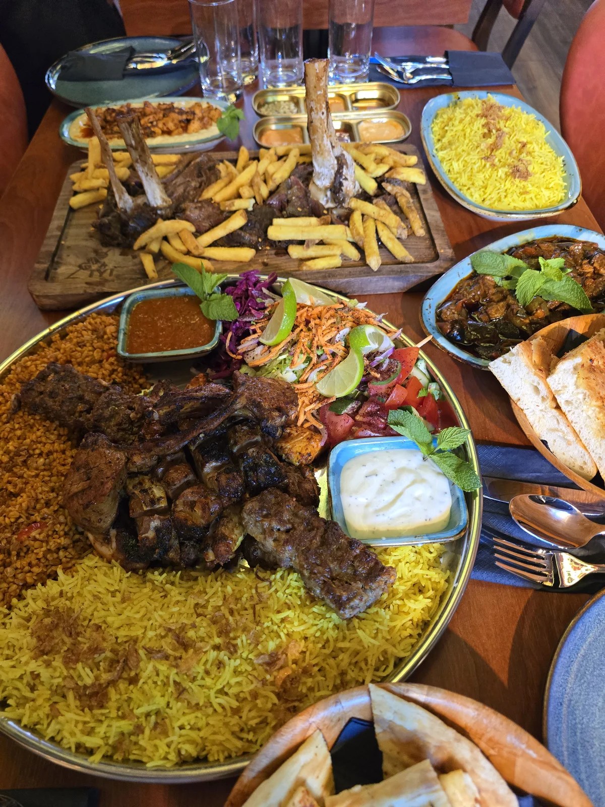 Turkish mixed grill platter, lamb shanks, rice and bread at IYI Luxury On Flames in Dagenham