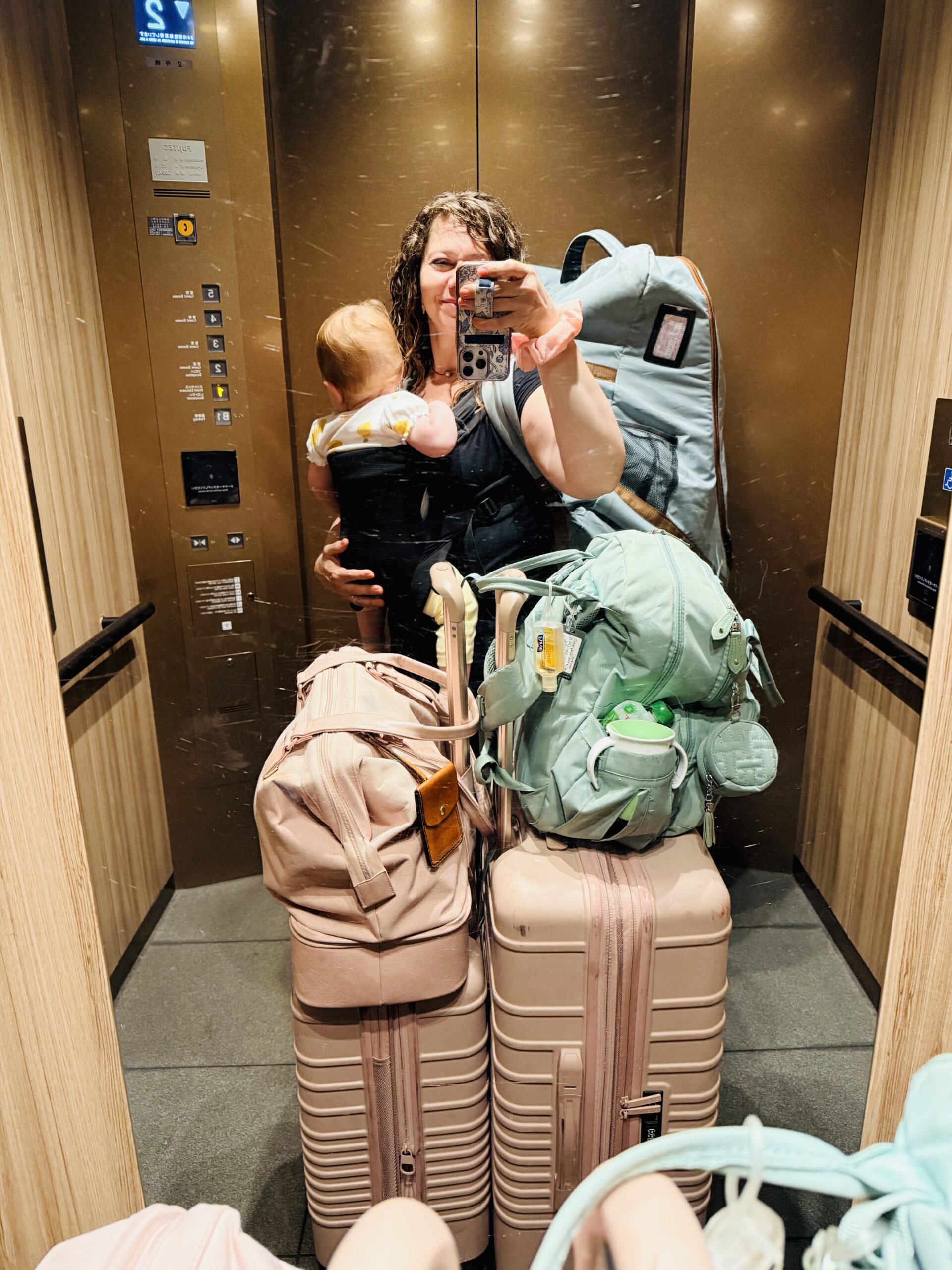Mother and daughter with luggage