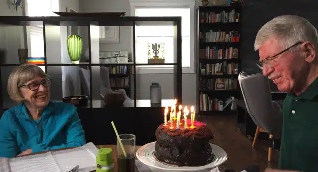 Dad blowing out candles