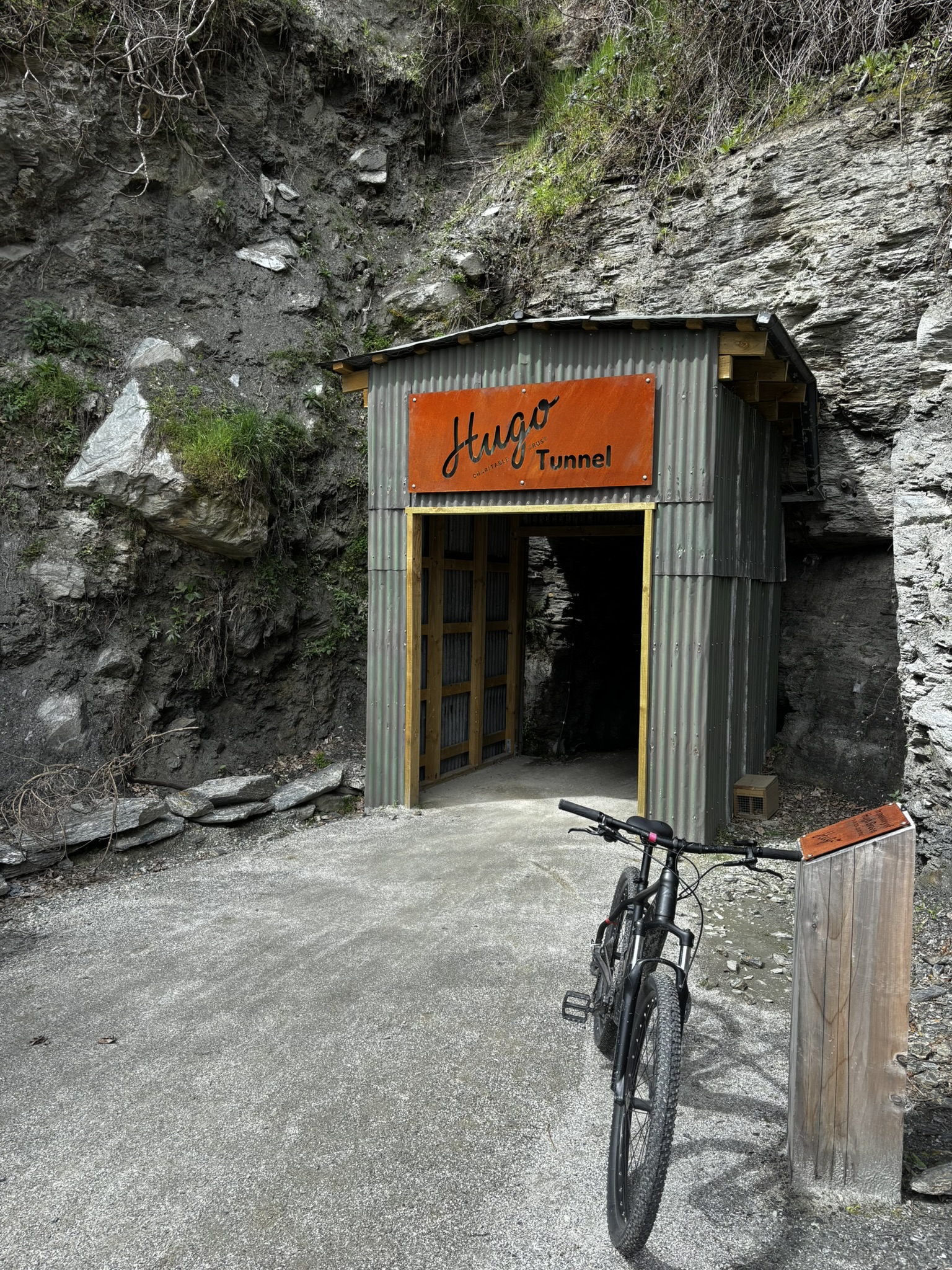 Hugo Tunnel in Queenstown with a bicycle in the foreground