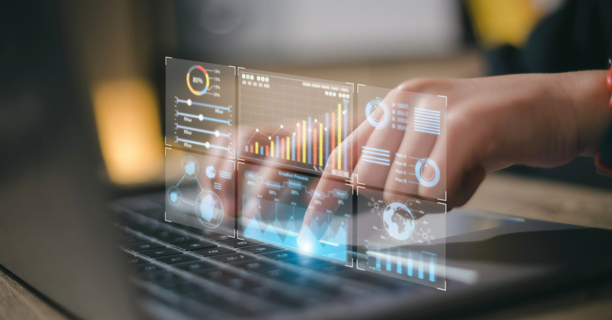Environmental consultant typing on a computer with advance analytics overlaying the image showing the importance of technologies for today's environmental consulting firms.