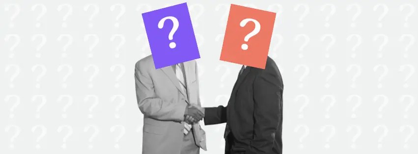Two professionals shaking hands with colorful question marks covering their heads, set against a background of faded question marks to illustrate the best questions to ask in an interview.