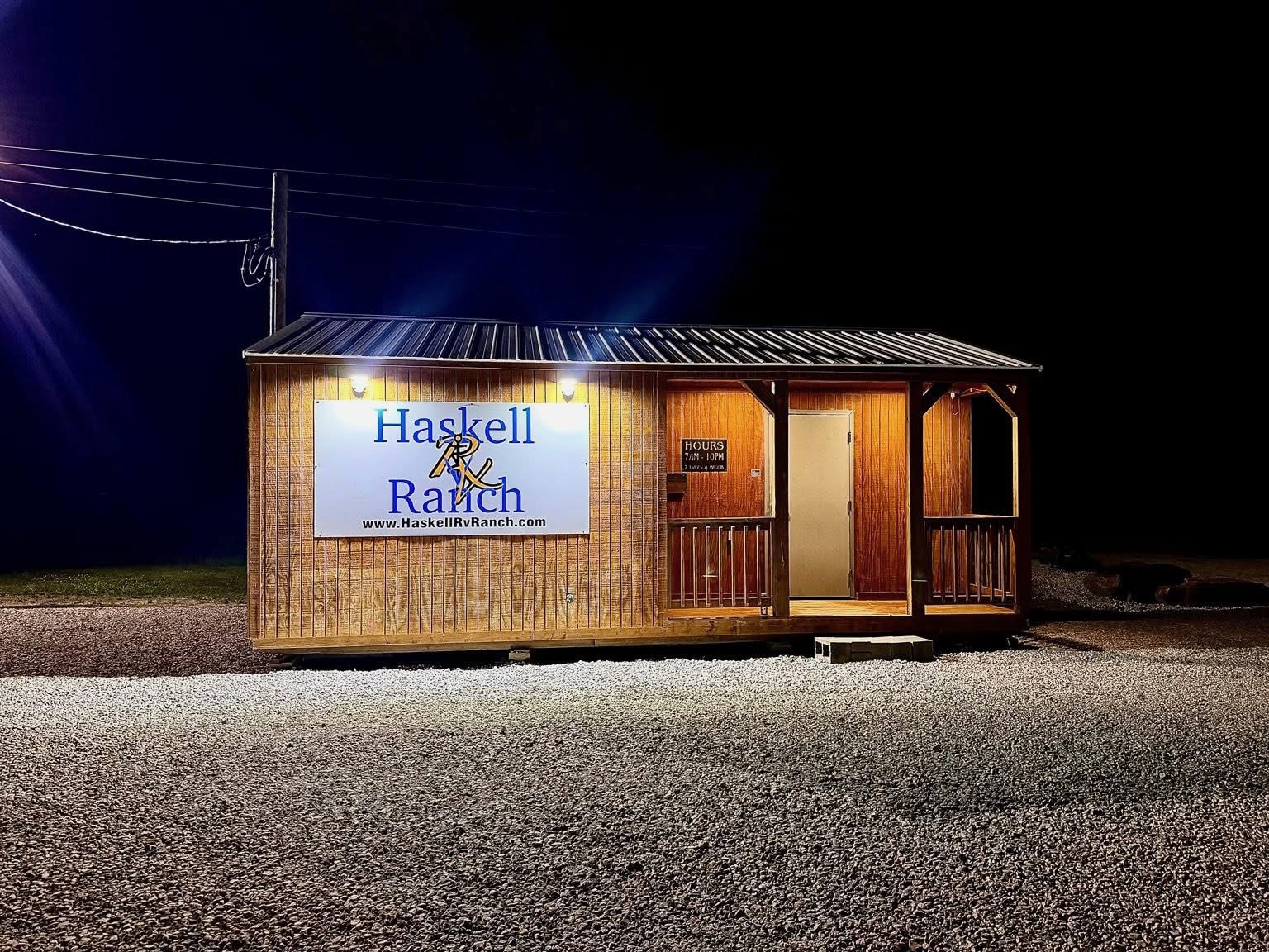 Haskell RV Ranch laundromat and community building illuminated at night