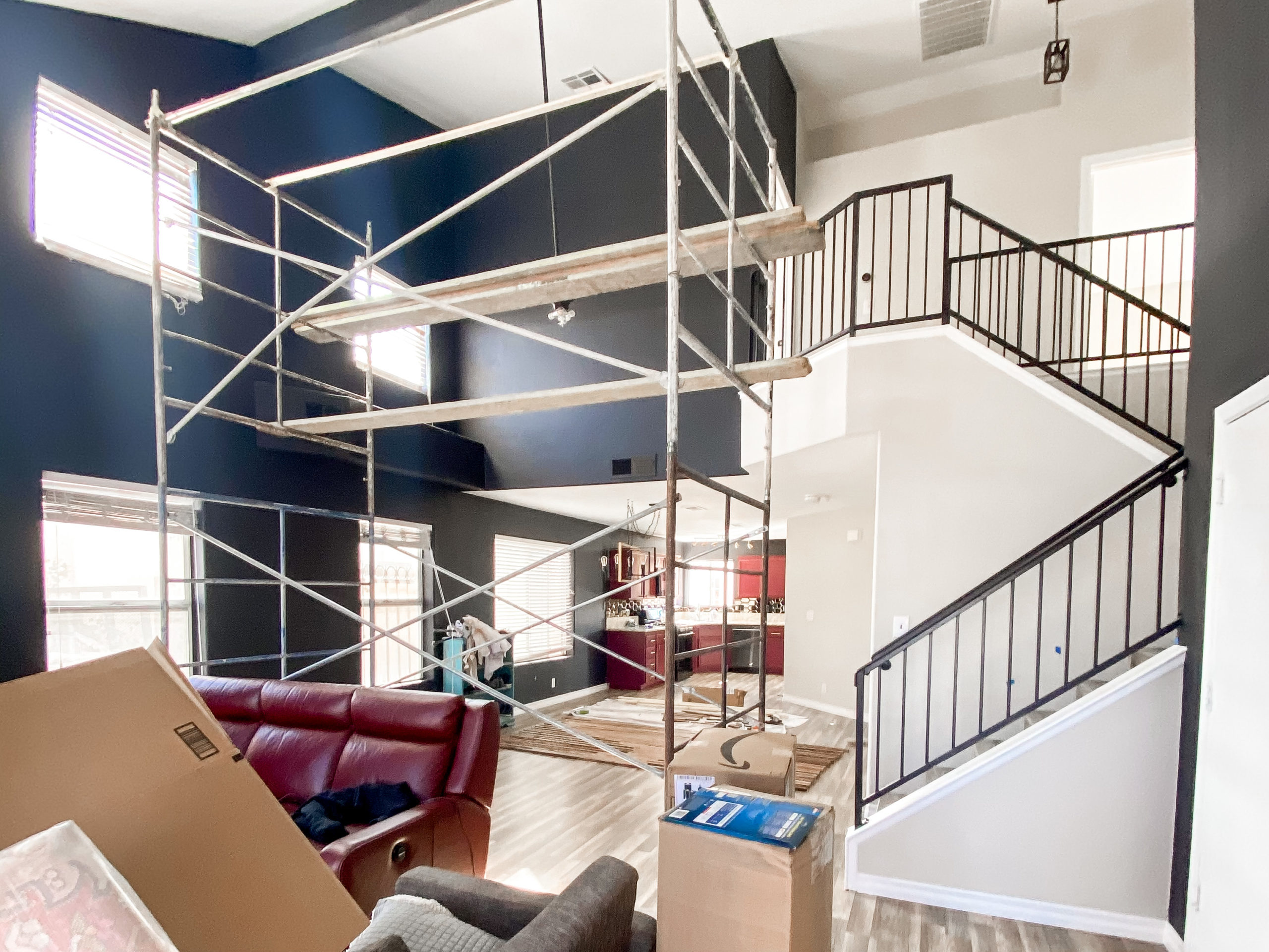 Black and Grey Color Wall Paint in a Grand Room with Tall Walls