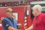 Hawkbill Base Presents a Check