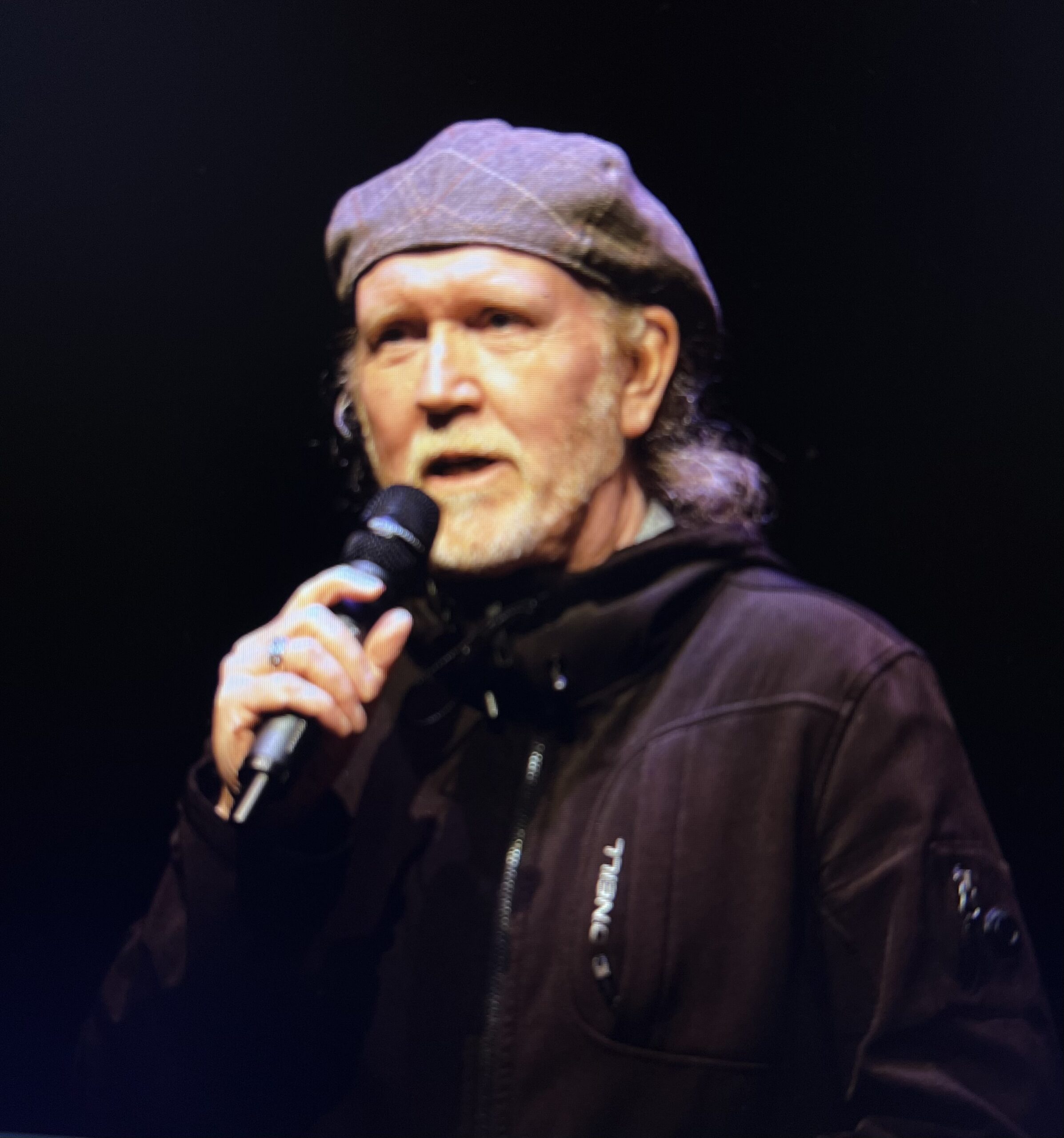 H. B. O’Neill speaking into a microphone