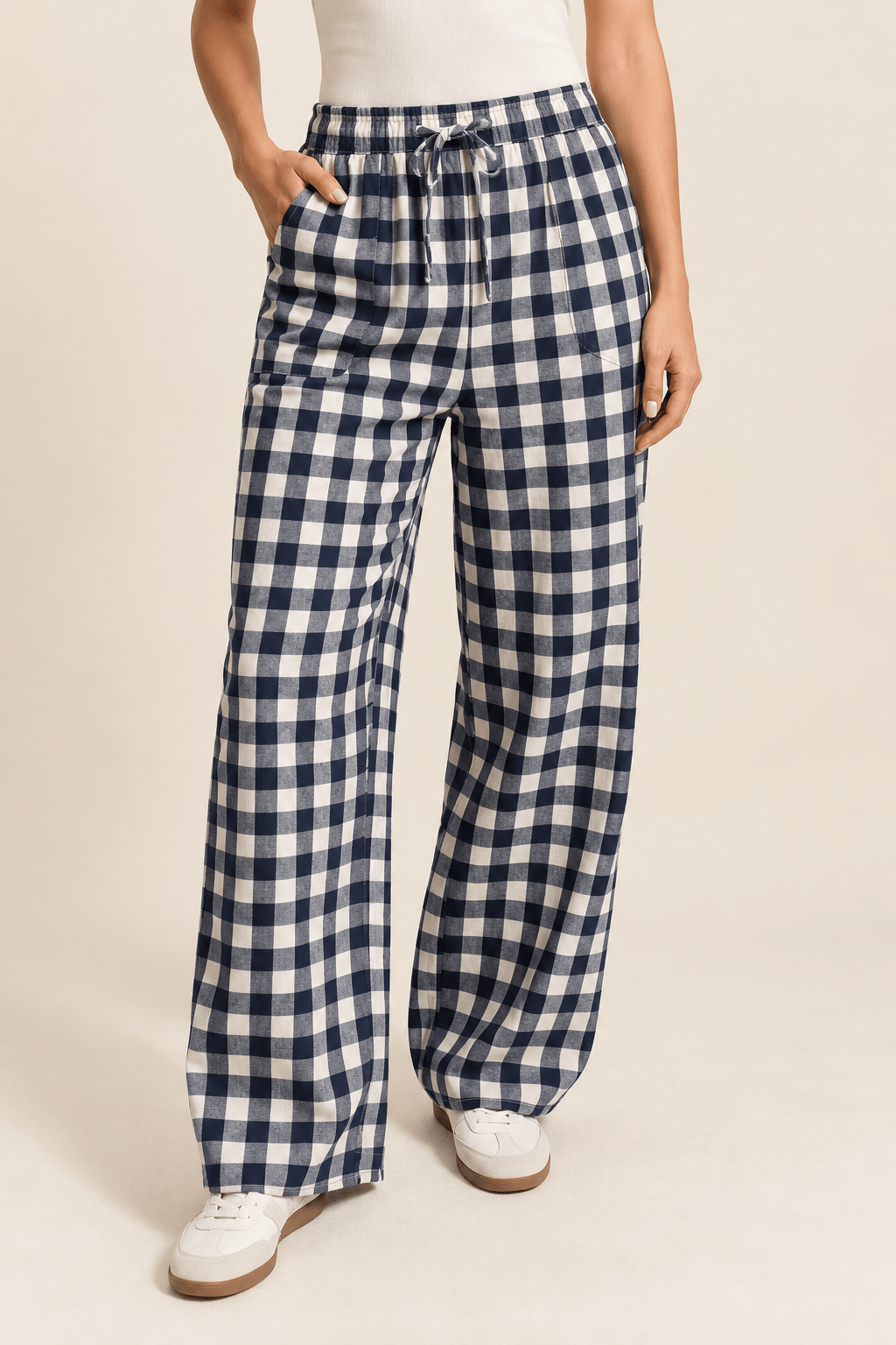 The Hadley Gingham Wide-Leg Pants in blue gingham with a relaxed wide leg and tie waist