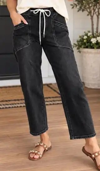 The Avery Drawstring Black Denim Pants in washed black denim with a white drawstring and front patch pockets