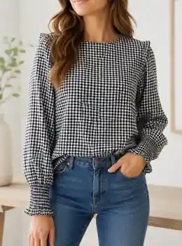 The Harper Gingham Ruffle Blouse in black-and-white gingham with ruffle shoulder detail
