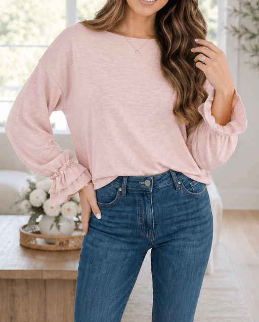 The Rosalie Ruffle Pullover in pink