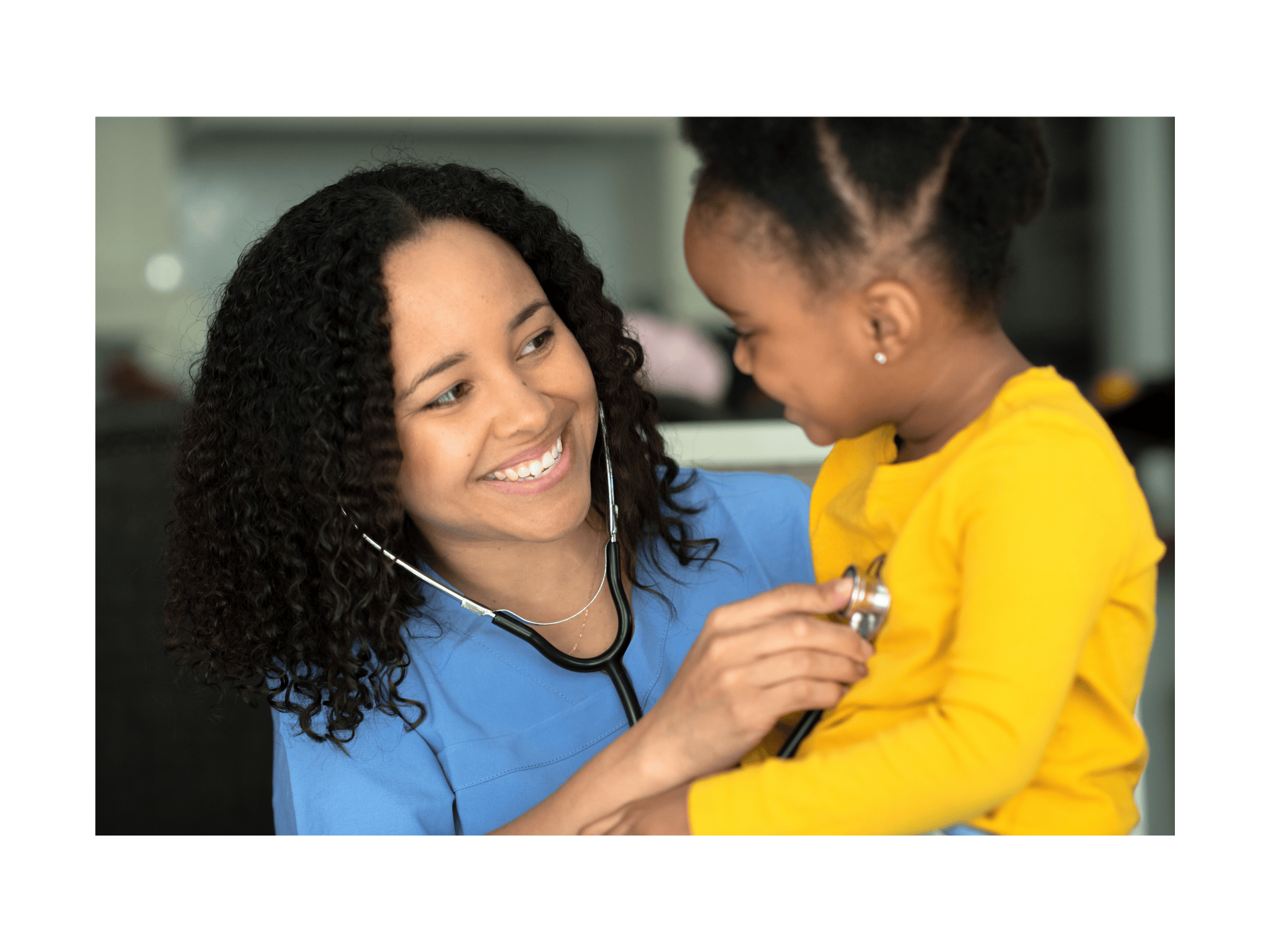 A smiling healthcare professional examines a young child with a stethoscope, creating a warm, caring atmosphere in a medical setting.